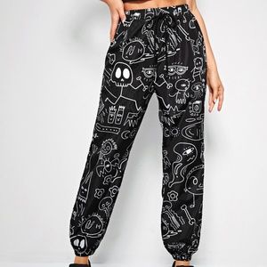 black and white allover cartoon wind breaker pants